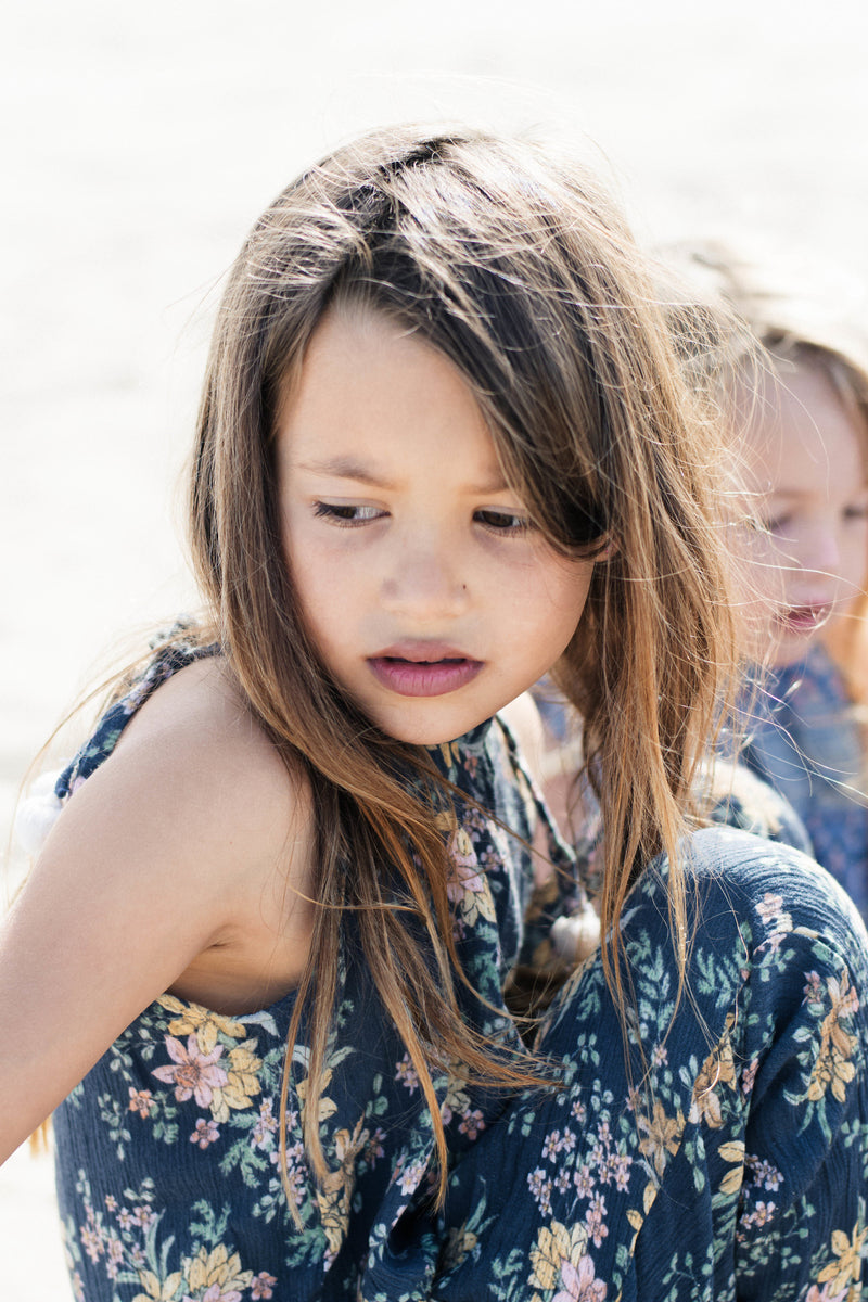 Girls Cozy Loose Fit Dark Blue Floral Pom Pom Jumper | Born By The Shore