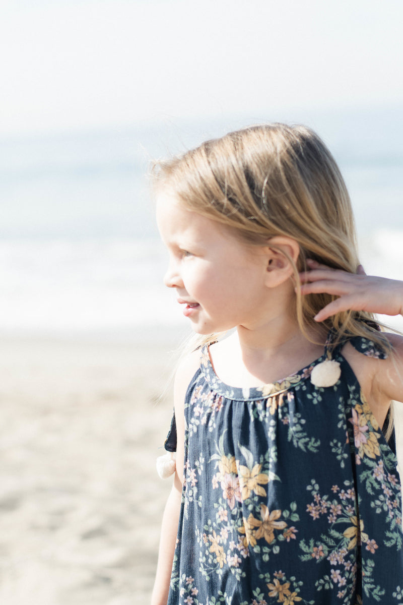 Toddler Girls Cozy Loose Fit Dark Blue Floral Pom Pom Trendy Jumpsuit Beach Outfit | Born By The Shore