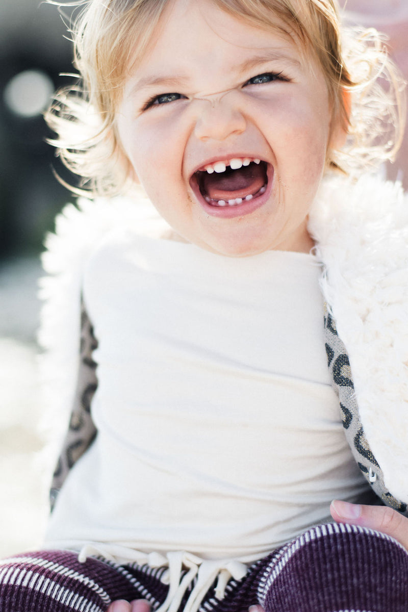 Baby Girls Unique Stylish White Faux Fur Vest | Born By The Shore