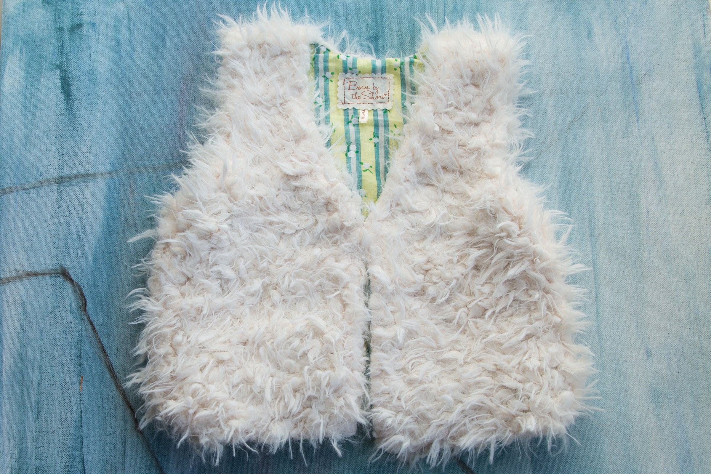 White faux outlet fur vest