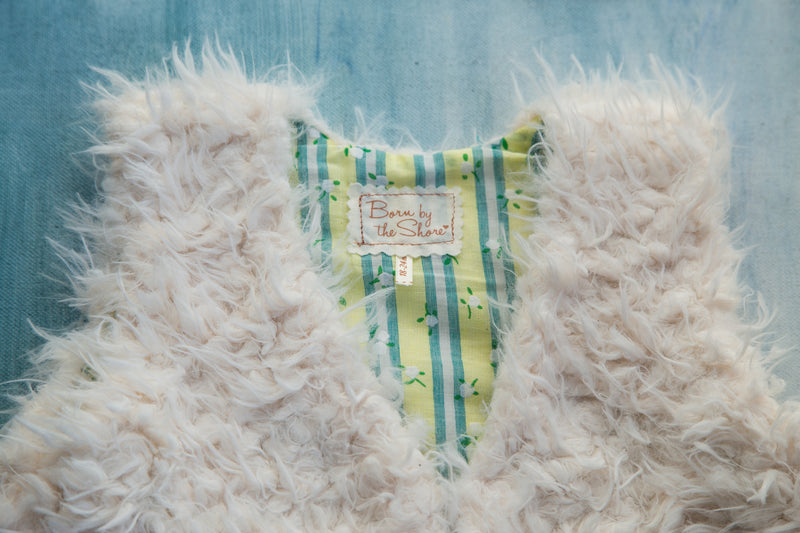 Baby & Toddler Girls White Faux Fur Vest with Soft Cotton Green Lining | Born By The Shore