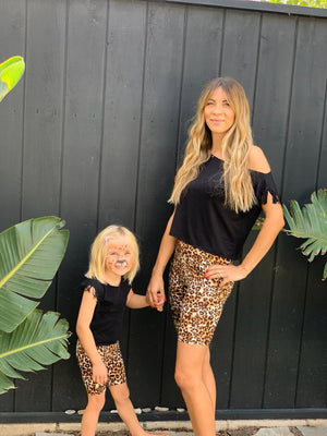 Mommy and me in matching leo animal print biker shorts. Must have summer outfits.